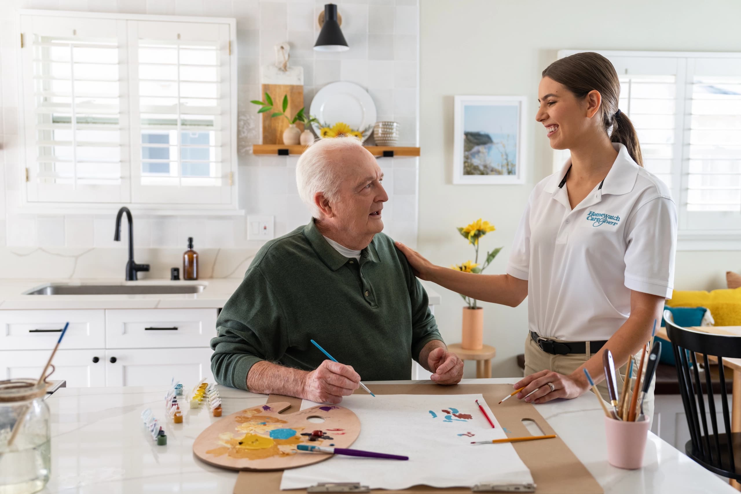 A Homewatch CareGivers caregiver helping a senior Houston client at home